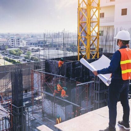 A constructional professional looking into a construction site he made
